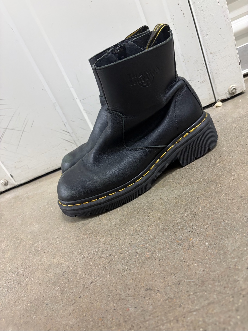 Dr. Martens Black Leather Ankle Boots with Yellow Stitching